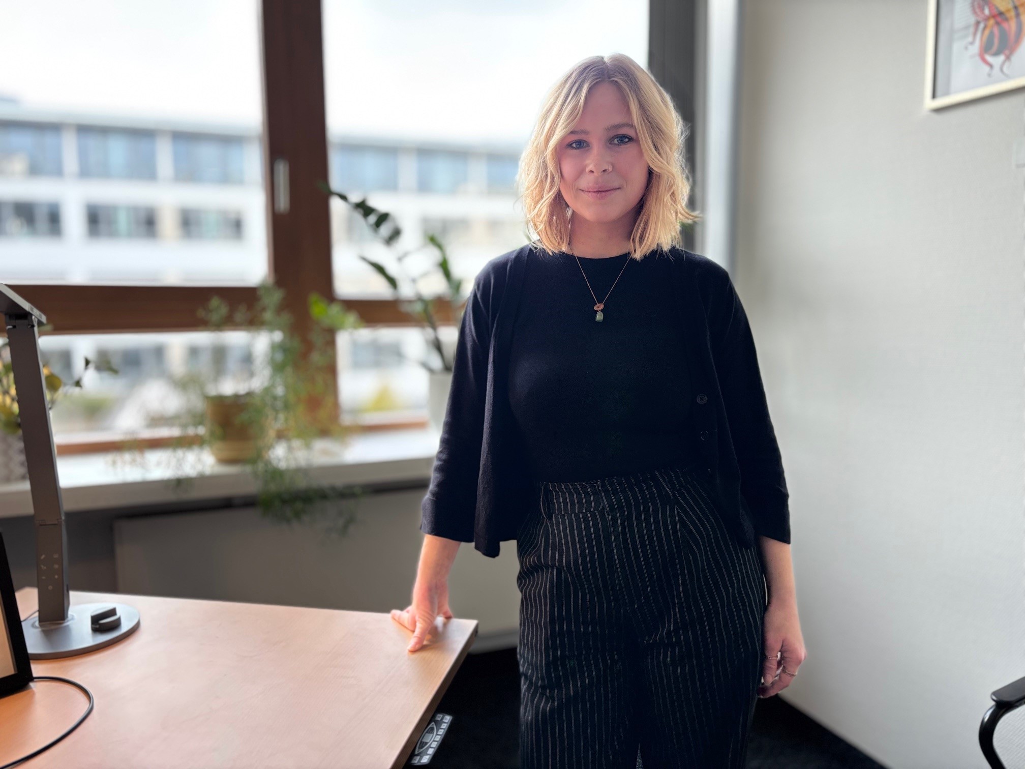 Profilbild von Jennifer im Büro